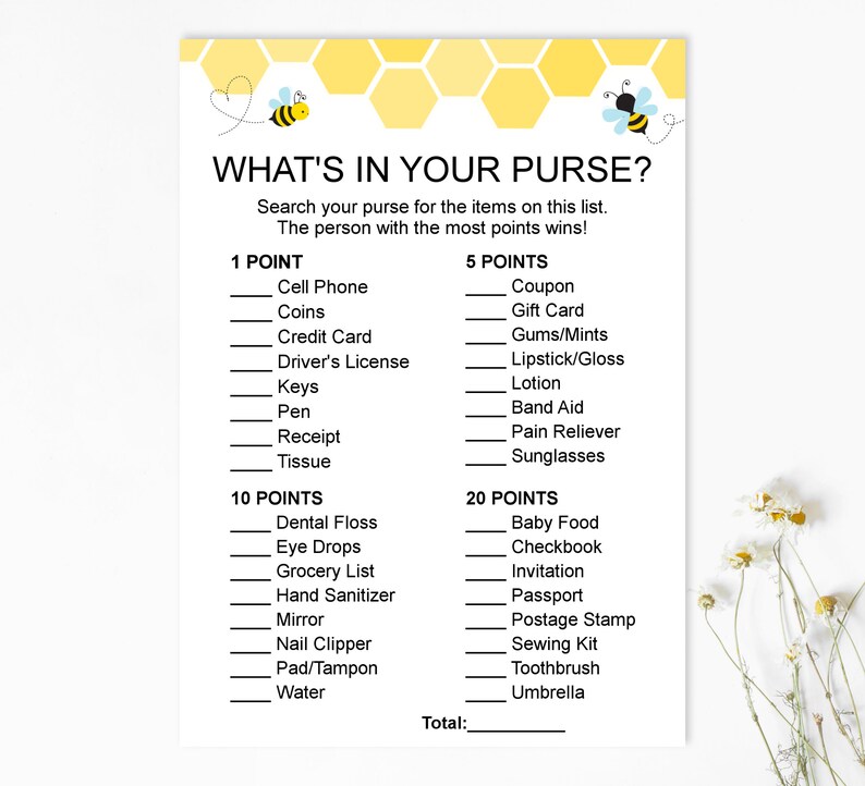 May include: A printable game card with a yellow honeycomb pattern and a cartoon bee. The game is called "What's in Your Purse?" and asks players to search their purse for items on the list. Points are awarded for each item found.