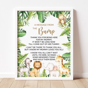 May include: A printable sign with a jungle theme. The sign says "A message from the Bump" and includes a poem about a baby on the way. The sign features a monkey, zebra, lion, elephant, and giraffe.