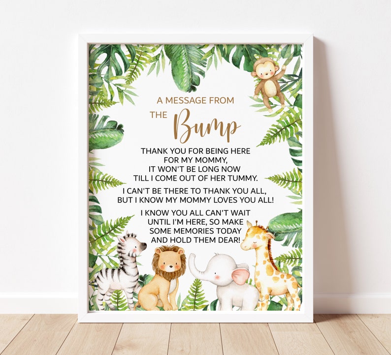 May include: A printable sign with a jungle theme. The sign says "A message from the Bump" and includes a poem about a baby on the way. The sign features a monkey, zebra, lion, elephant, and giraffe.