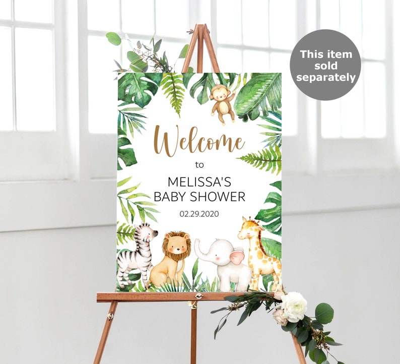 May include: A welcome sign for Melissa's baby shower, featuring a jungle theme with a zebra, lion, elephant, giraffe, and monkey. The sign is decorated with green tropical leaves and the date 02.29.2020.