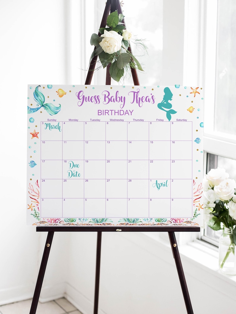 May include: A white calendar with a purple and teal mermaid design. The calendar is for the month of March and April. The text "Guess Baby Thea's Birthday" is at the top of the calendar.