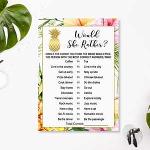 May include: A tropical-themed bridal shower game with the text "Would She Rather?" and a list of questions for guests to answer about the bride. The game features a pineapple graphic and floral accents.