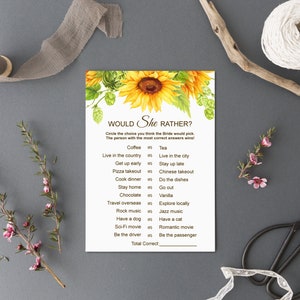 May include: A printable bridal shower game with a sunflower design. The game asks guests to guess the bride's preferences by circling their answers to questions like "Coffee or Tea?" and "Live in the country or Live in the city?"