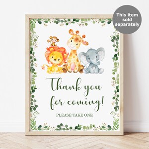 May include: A printable thank you sign with a green leafy border. The sign features a lion, giraffe, and elephant with the text "Thank you for coming! Please take one."
