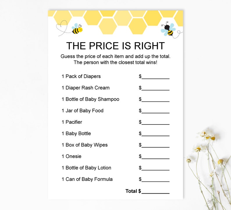 May include: A printable game card with a yellow honeycomb pattern and bee illustrations. The game is called "The Price is Right" and asks players to guess the price of baby items, such as diapers, rash cream, and formula.