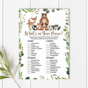 May include: A printable game card with a woodland theme. The card has a brown bear, a fox, a deer, a raccoon, and a squirrel. The text on the card reads "What's in Your Purse?" and lists items to find in a purse with points assigned to each item.