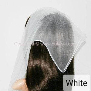 May include: White sheer fabric head scarf. The scarf is folded into a triangle shape and tied at the back of the head.