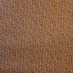 May include: Close-up of a fabric with a repeating pattern. The background is a mustard yellow color with vertical white stripes. Dark brown floral vines are interspersed between the white stripes, creating a textured design.