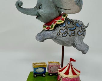 Disney Traditions Jim Shore Dumbo Figurine “Faith in Flight” – 4010028 – Carved Resin Elephant with Circus Base – Walt Disney Showcase