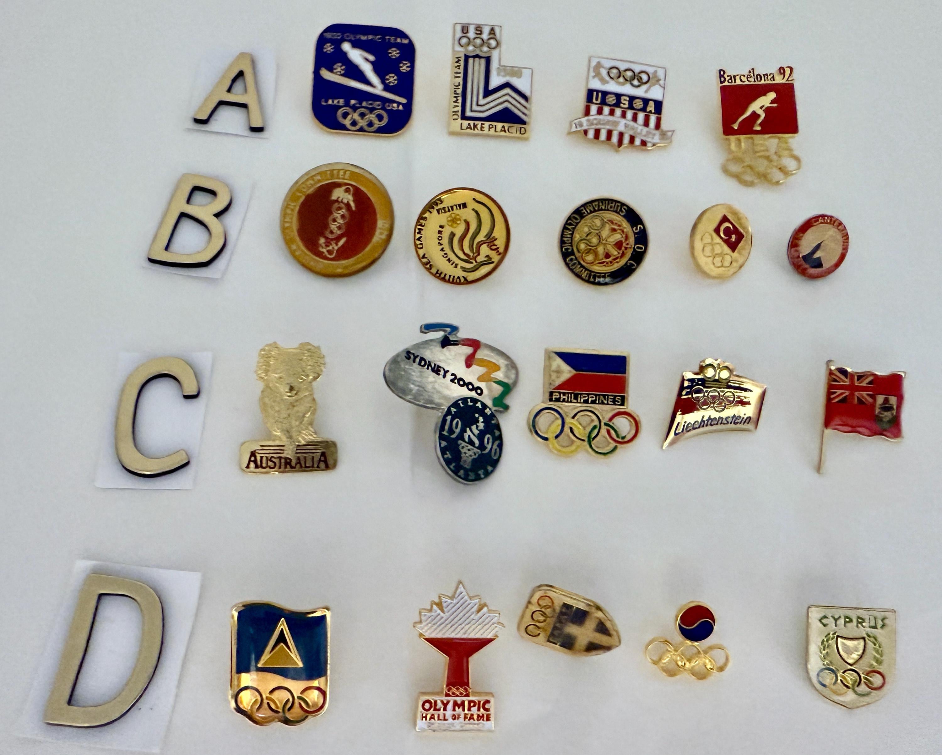 International Olympic Games Pin Collection – 20 Vintage Enamel