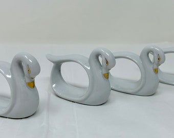 set of 4 porcelain swan white gold details napkin rings table setting