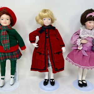 vintage Avon porcelain girl doll 10&quot; &quot;Favorite Dolly&quot; &quot;Kitty Love&quot; &quot;Skating Party&quot; cat iceskating Victorian holiday Christmas