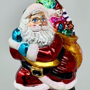 vintage Christopher Radko blown glass ornament Santa Clause Christmas holiday Little Big Nick gold bag