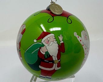 Pier 1 Li Bien Santa Getting Dressed Christmas Ornament 4” Reverse Painted Glass Boxed