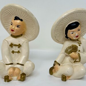 set of 2 vintage 1950&#39;s  chalkware chalk figurines boy girl Asian Chinese Japanese sitting hat Statuary Universal  Corp