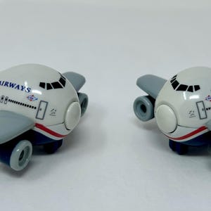 Set of 2 Vintage US Airways Bubble Plane Refrigerator Magnets – Aviation Toy Souvenirs