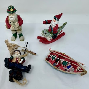 set of 4 fishing fisherman ornaments  Santa riding fish whimsical resin boat sea holiday Christmas