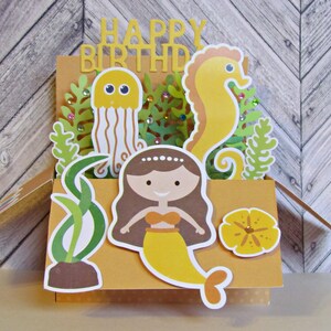 Pop Up Karte Meerjungfrau. Fisch. Alles Gute zum Geburtstag. Grusskarten. Handgemachte Pop Up Karte. Für jeden Anlass. Ozean. Bunt. Meerjungfrau-Karte. Kinder.