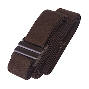 May include: A brown elastic belt with a plastic buckle. The belt is rolled up and the buckle is visible.