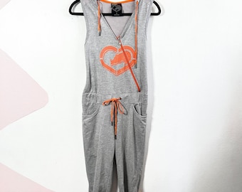 Vintage echo rode jumpsuit, maat klein taille en zakken met trekkoord, jaren 2000