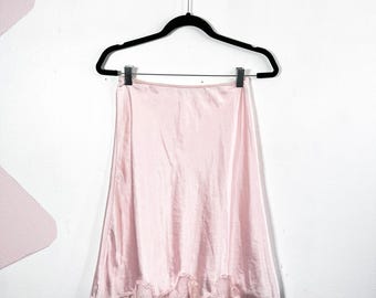 Falda lencera vintage de los años 80 para mujer, talla pequeña, rosa, de encaje, coqueta y delicada.