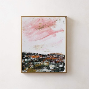 May include: Abstract painting with a pink and gold sky over a dark green and brown landscape. The painting is framed in a gold frame.