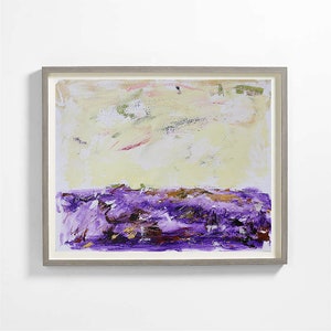May include: Abstract painting with a yellow and white background and a purple and brown foreground. The painting is framed in a light gray frame.