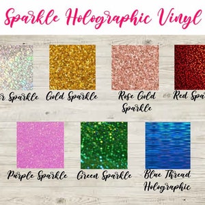 May include: A selection of holographic vinyl in various colours, including silver, gold, rose gold, red, purple, green, and blue. The vinyl is labelled with the colour and type of sparkle or holographic effect.