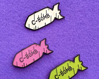 C-Bomb enamel pin badge