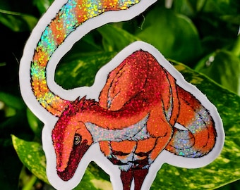 Adesivo in vinile glitterato Sinosauropteryx 3" - Paleoarte originale dei dinosauri