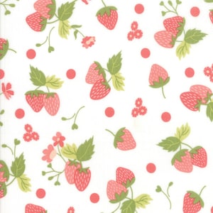 May include: A white background with a repeating pattern of pink strawberries and small pink dots. The strawberries have green leaves and are arranged in a random pattern.