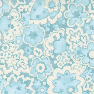 May include: A blue and white floral pattern fabric with a repeating design of stylized flowers and leaves.