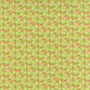 May include: A green fabric with a repeating pattern of red and white sunglasses. The sunglasses are in a variety of positions and angles.
