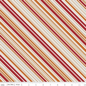 Pode incluir: Tecido branco com listras diagonais em vermelho, laranja e cinza claro.