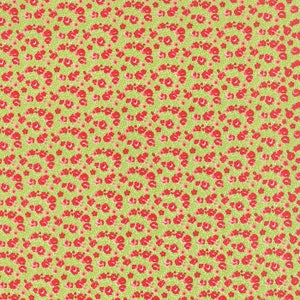 以下が含まれることがあります： 小さな赤い花が繰り返しパターンで描かれた緑色の生地。花は対称的なパターンで配置されています。
