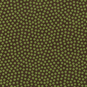 Könnte beinhalten: Ein brauner Stoff mit einem sich wiederholenden Muster aus grünen Kreisen. Die Kreise sind diagonal angeordnet.