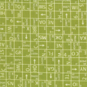 May include: A green fabric with a grid pattern and white text. The text includes state abbreviations and street names. The text is in a white font and the background is a light green.