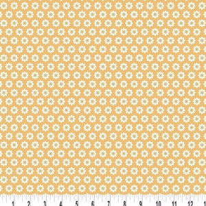 May include: A yellow fabric with a white floral pattern. The fabric is covered in small white flowers with a light green center.