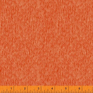May include: Orange fabric with a textured, vertical striped pattern. The fabric is measured with a ruler in inches.