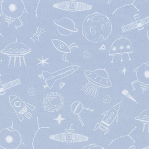 May include: A light blue fabric with a white repeating pattern of space-themed illustrations. The pattern includes rockets, planets, stars, satellites, and UFOs.