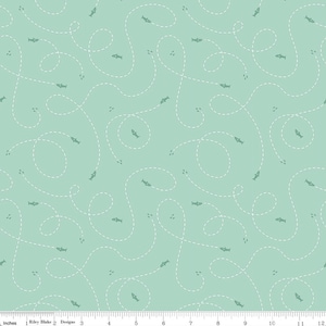 May include: A teal blue fabric with a white dashed line pattern of fish swimming. The fish are all facing the same direction and have a simple design.