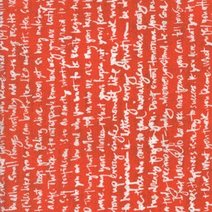 Puede incluir: Tela roja con texto blanco impreso en ella. El texto está escrito a mano e incluye frases como "la belleza comienza en el momento en que decides ser tú mismo" y "la felicidad es dejar que cada estación de tu vida sea una bendición".