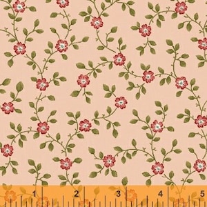 May include: A pink fabric with a repeating pattern of small red flowers and green leaves. The fabric is measured with a ruler in inches.