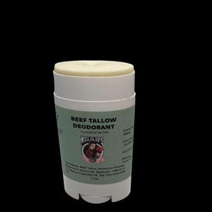 May include: A white deodorant stick with a light green label. The label reads "BEEF TALLOW DEODORANT" and "WELILIPS". Ingredients and the size, 70.87 g, are also listed on the label.