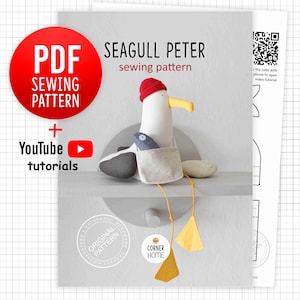 May include: A PDF sewing pattern for a stuffed seagull toy named Peter, with included YouTube tutorials. The seagull is white with a red hat, yellow beak, and a pocket holding a blue fish. The design includes two yellow triangle shapes.