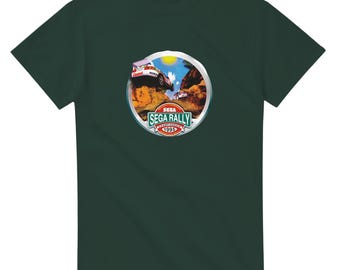 May include: A dark green t-shirt with a circular graphic of a car racing on a dirt track. The graphic includes the text "SEGA RALLY CHAMPIONSHIP 1995".