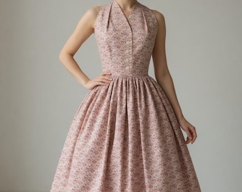 Precioso vestido de verano estilo años 50 con estampado floral y escote halter.