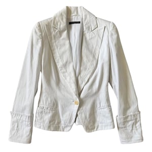 Alexander McQueen S/S 2000 “Eye” collection cutout jacket.