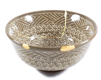 Antique traditional Japanese Kintsugi bowl, gift for overcoming a difficult period or achievement.