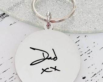 Laser Engraved from a photo of your handwriting or drawing keyring. Engraved from any clear image, or logo